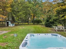 Cozy Pocono Cottage - Hot Tub, Firepit & Swings - Image 2