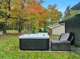 Cozy Pocono Cottage - Hot Tub, Firepit & Swings - Image 3