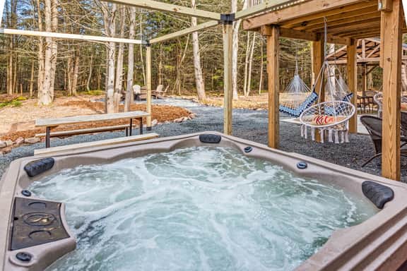 Cozy Cinema Cabin: Theater, Hot Tub & Game Room